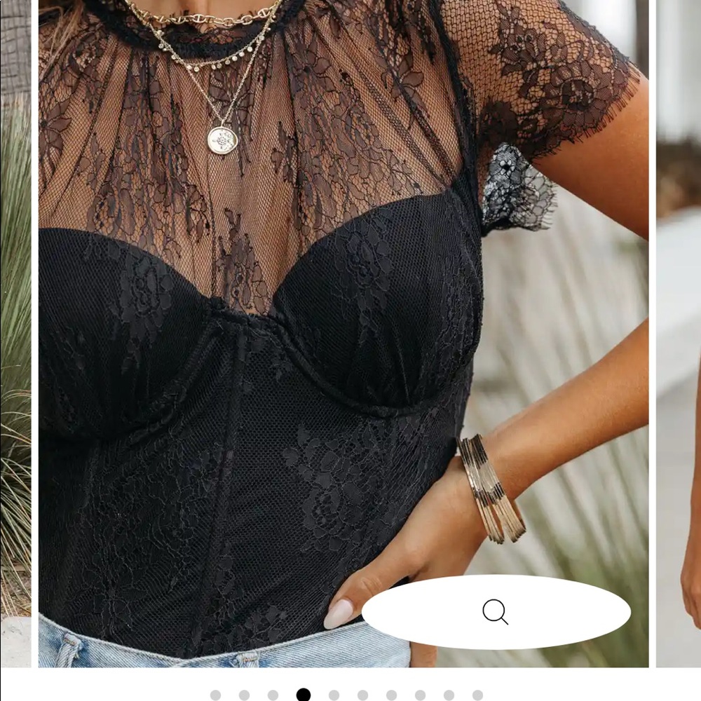 Never been worn, beautiful lace bodysuit with cors